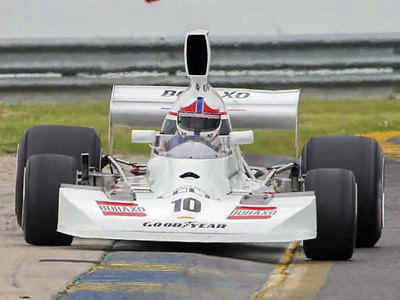 Todd Stewart bounces T430 HU3 over the kerbs at Sandown in late 2003. Copyright Warbirds Photography 2005. Used with permission. Todd Stewart bounces T430 HU3 over the kerbs at Sandown in late 2003. Copyright Warbirds Photography 2005. Used with permission.