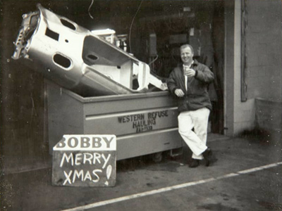 Tom Herrmann with the Eagle monocoque damaged by Bobby Unser in a test at Riverside in December 1968. Copyright From the Collections of The Henry Ford. Gift of Bobby Unser. Used with permission. Tom Herrmann with the Eagle monocoque damaged by Bobby Unser in a test at Riverside in December 1968. Copyright From the Collections of The Henry Ford. Gift of Bobby Unser. Used with permission.