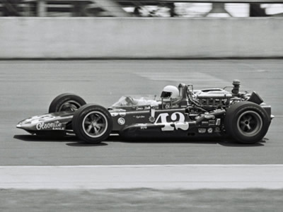Denny Hulme in his #42 Olsonite Eagle at the 1969 Indy 500. Part of the Dave Friedman collection. Licenced by The Henry Ford under Creative Commons licence Attribution-NonCommercial-NoDerivs 2.0 Generic. Original image has been cropped. Denny Hulme in his #42 Olsonite Eagle at the 1969 Indy 500. Part of the Dave Friedman collection. Licenced by The Henry Ford under Creative Commons licence Attribution-NonCommercial-NoDerivs 2.0 Generic. Original image has been cropped.